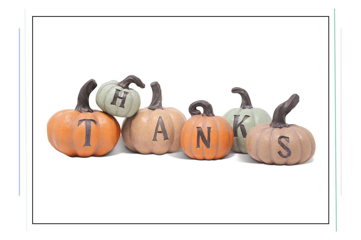 An image of ceramic pumpkins that say "thanks"