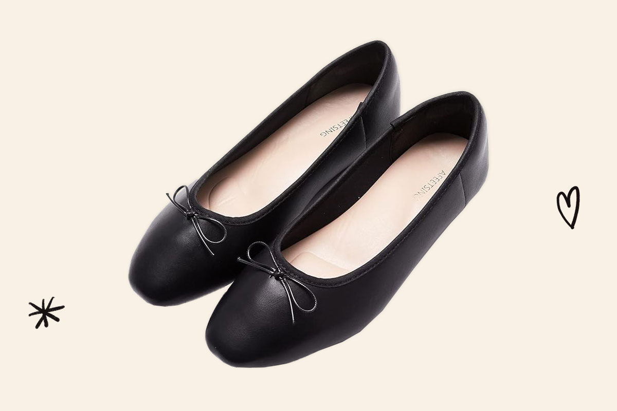 An image of black round toe ballet flats