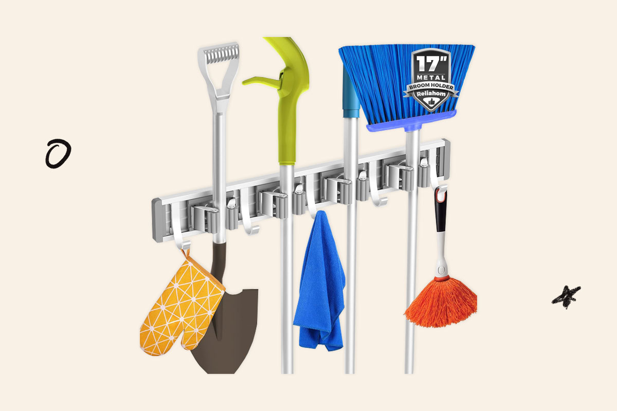 An image of a wall mounted broom organizer