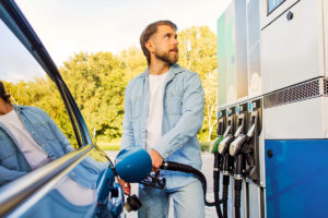 Man pumping gas