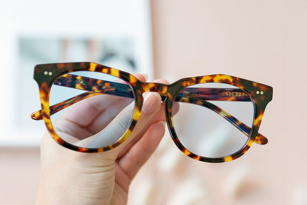 Glasses with blue-tinged lenses