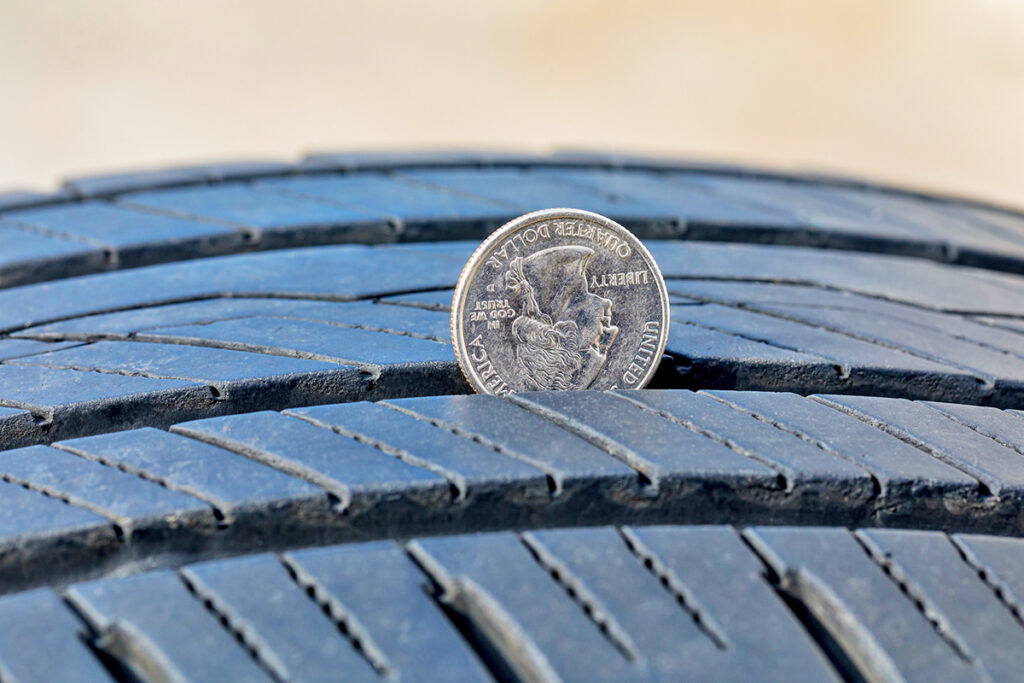 Quarter in a tire tread