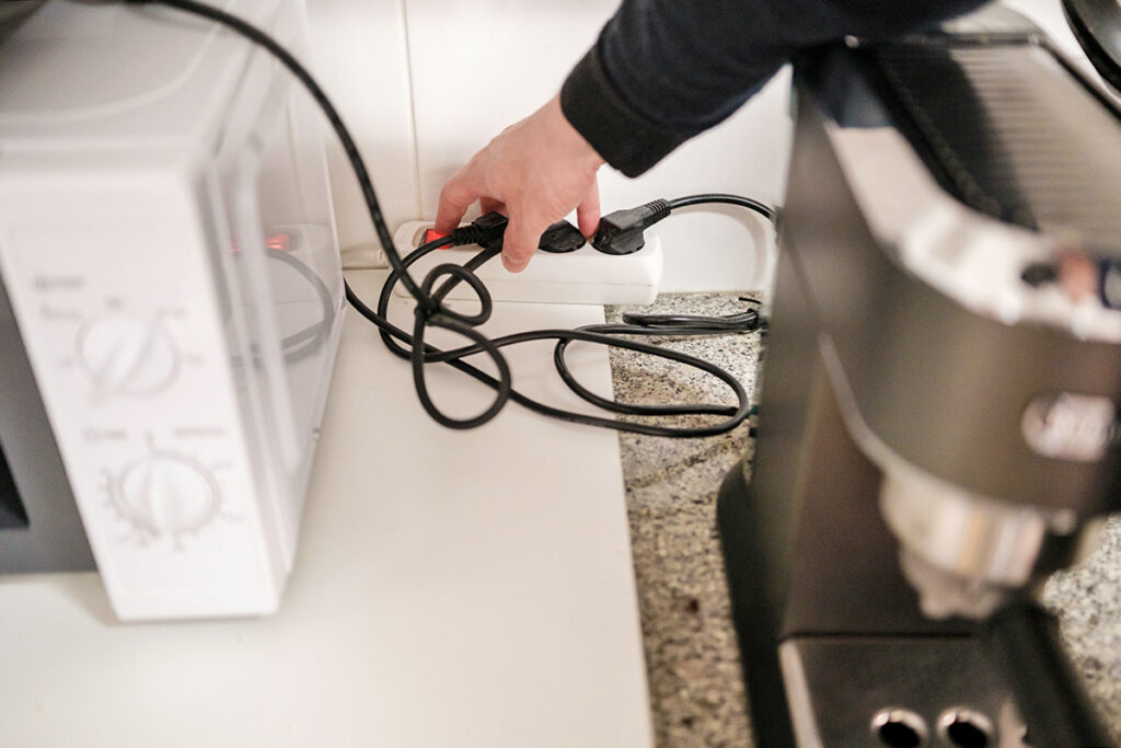 Plugging a microwave into a power strip