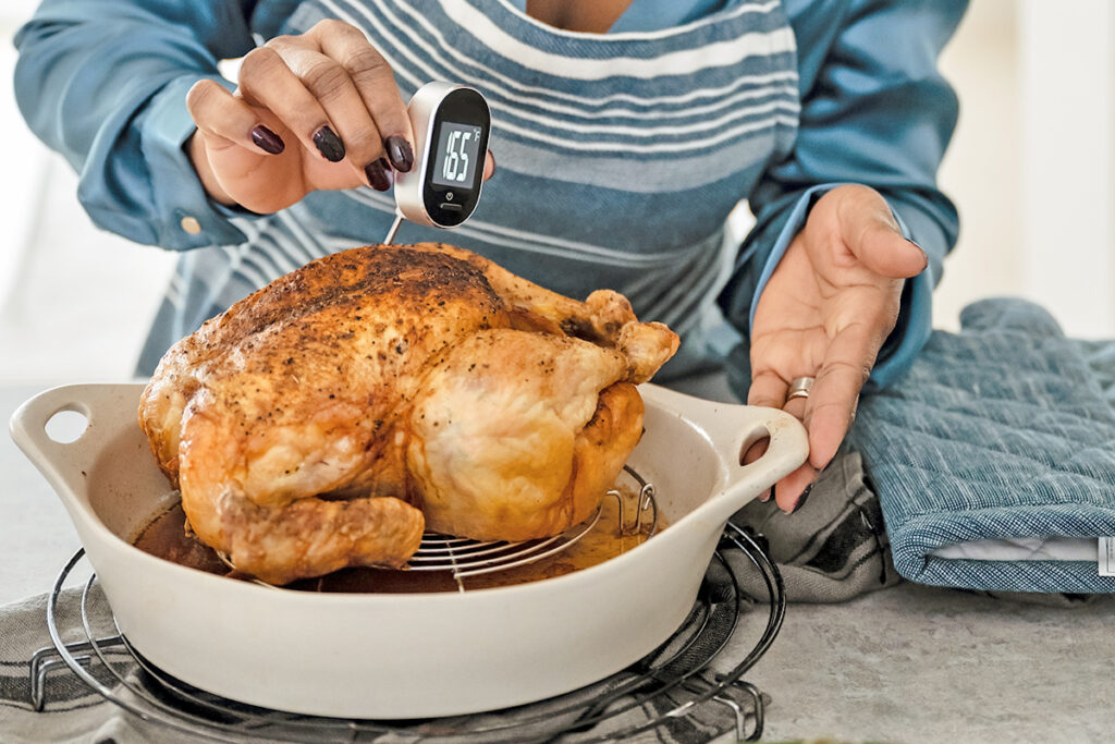 Using meat thermometer on whole chicken
