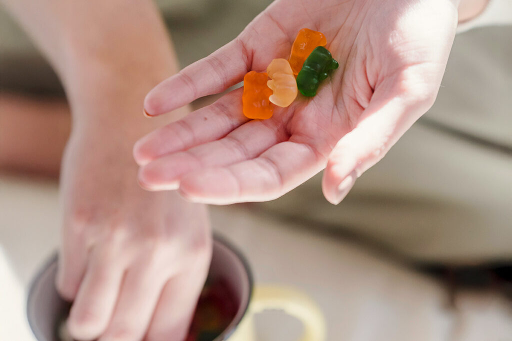 Gummy bears in hand