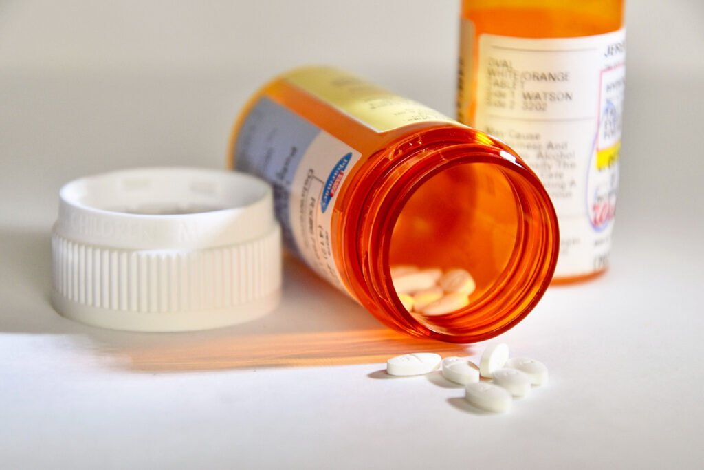 Medications spilling out of prescription bottles