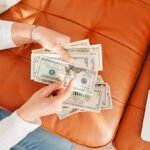 Person counting money