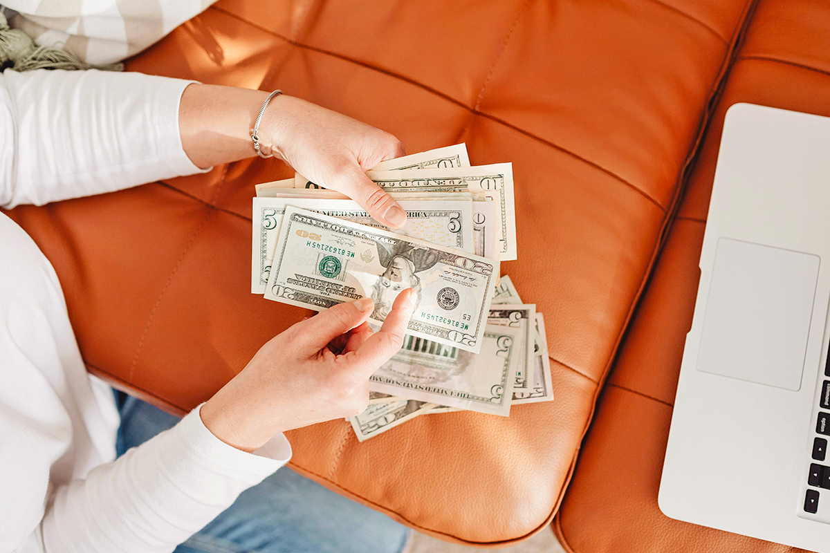 Person counting money