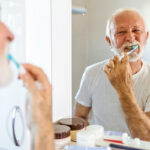 Man brushing teeth