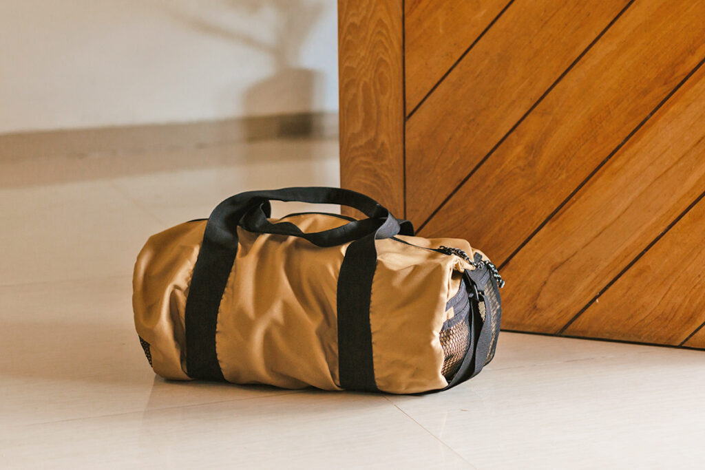 Packed bag by door